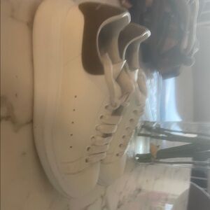 Chic White Sneakers with Brown Accent